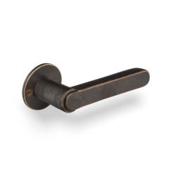 Poignée de porte TUKAN sur rosace ronde 50F bronze foncé Dauby